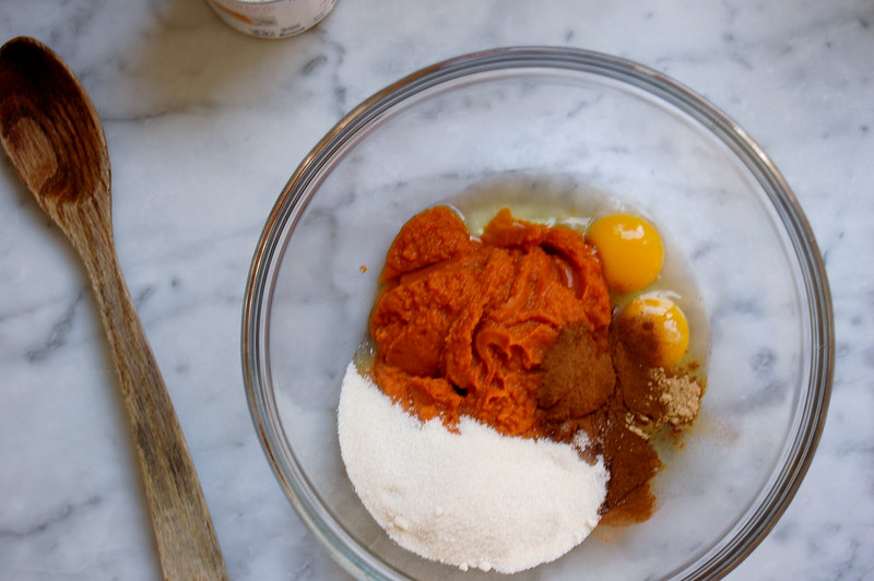 pumpkin pie ingredients in glass bowl