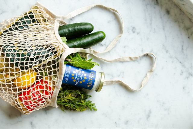 green produce in net grocery bag eco-friendly