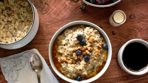bowl of healthy multigrain oatmeal for breakfast with berries