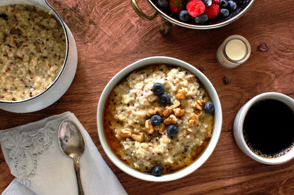 bowl of healthy multigrain oatmeal for breakfast with berries