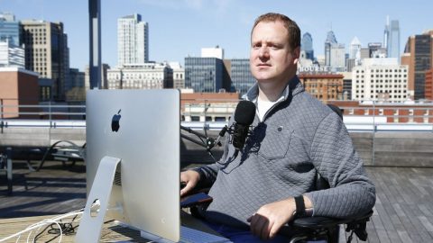 Chef Eli Kulp on roof with microphone and laptop