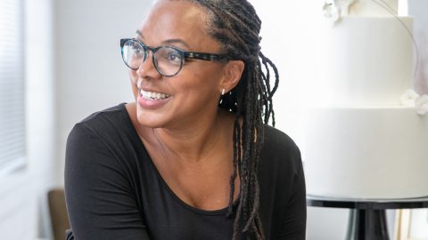 head shot Monica OConnell with cake