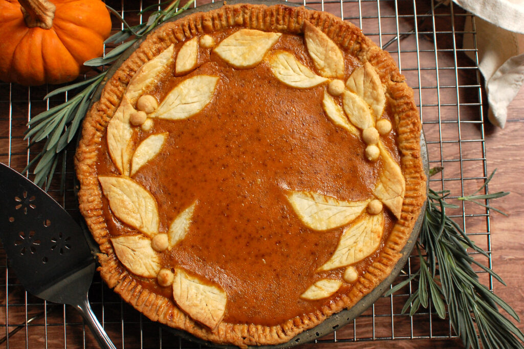 Cooling Libby's pumpkin pie on wire rack to finish setting custard and maintain smooth center