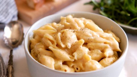 bowl of creamy stovetop mac and cheese with spoon