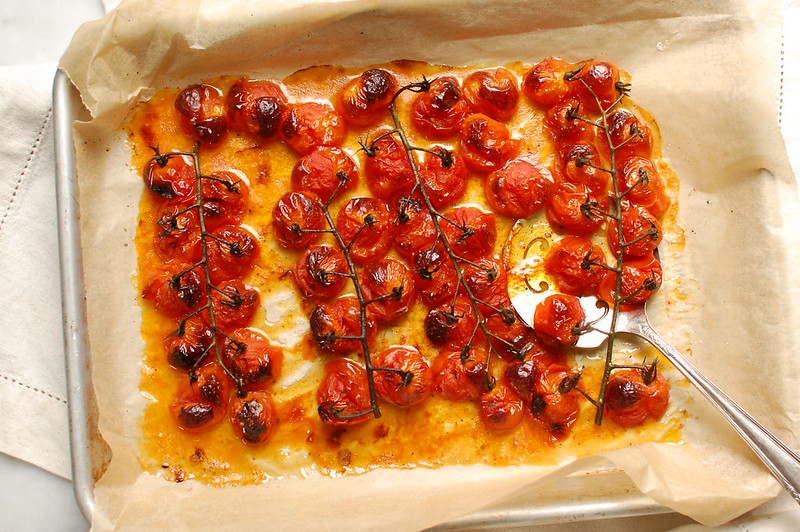roasted grape tomatoes on baking sheet