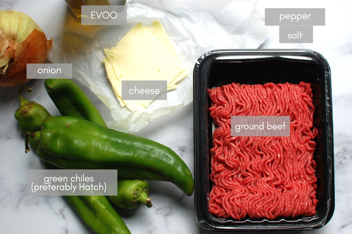 Ingredients for Hatch green chile cheeseburger: roasted green chiles, diced onions, jack cheese, 80/20 ground beef, olive oil, and hamburger buns