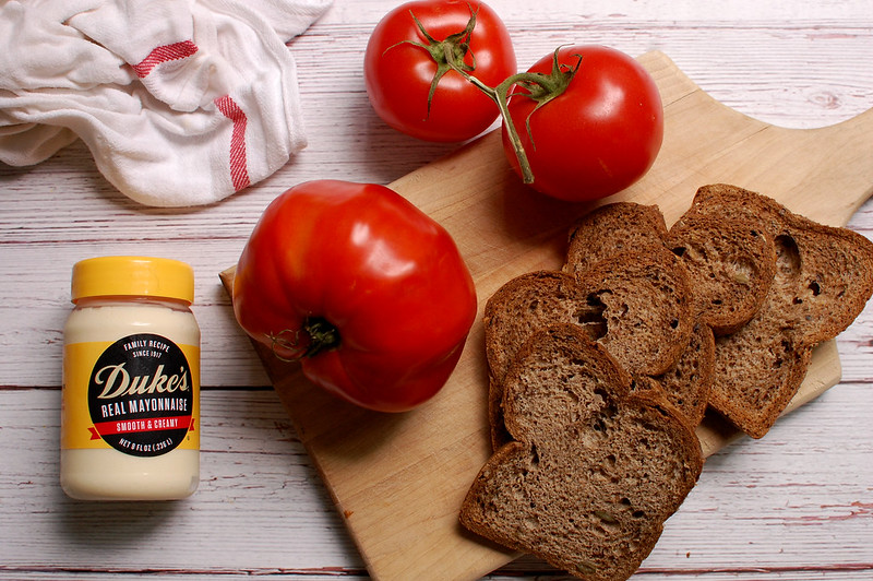 ingredients of mayo, tomato, and bread for tomato sandwiches