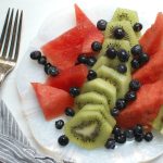 cut kiwi fruit slices with fruit.