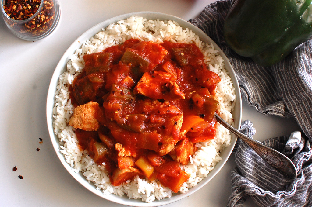 pollo alla cacciatora served on rice