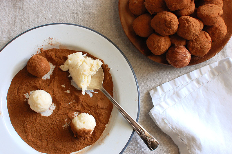 Coconut buttercream scooped into balls and rolled in cinnamon