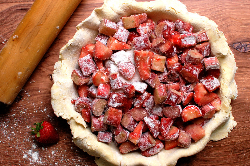 pie filling in pie shell before baking