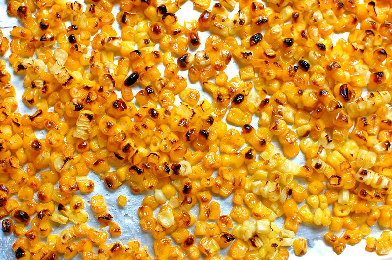 broiled corn kernels on sheet pan