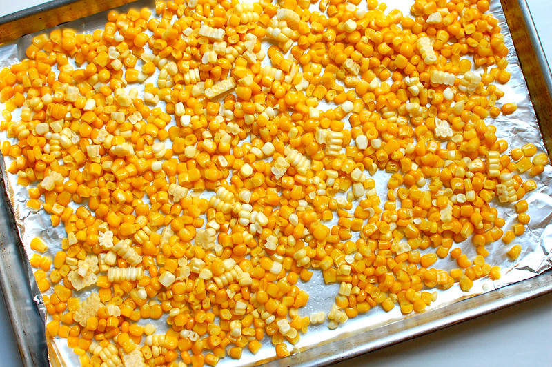 raw corn on sheet pan