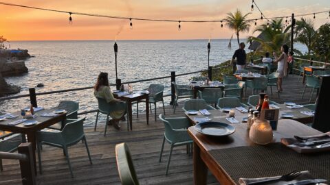 best restaurant Negril Jamaica sunset dinner on the outdoor dining deck of Rock House Restaurant Negril.