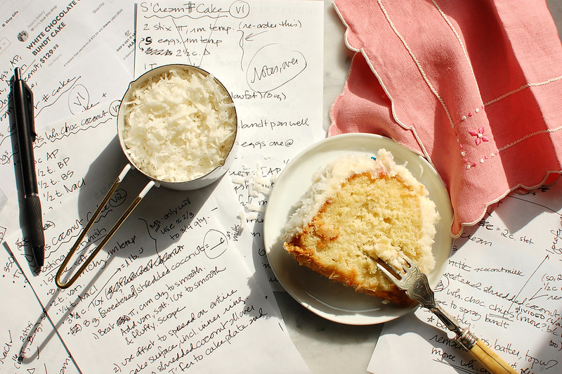 Copycat Tom Cruise coconut cake recipe testing notes and research with slice of cake.