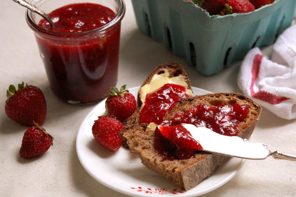 Easy homemade strawberry preserves spread on sourdough toast: a simple, fresh strawberry jam recip