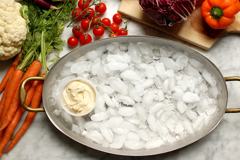 base of crushed ice for platter of crudites