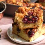 Blackberry coffee cake with sour cream and streusel topping, cut into squares