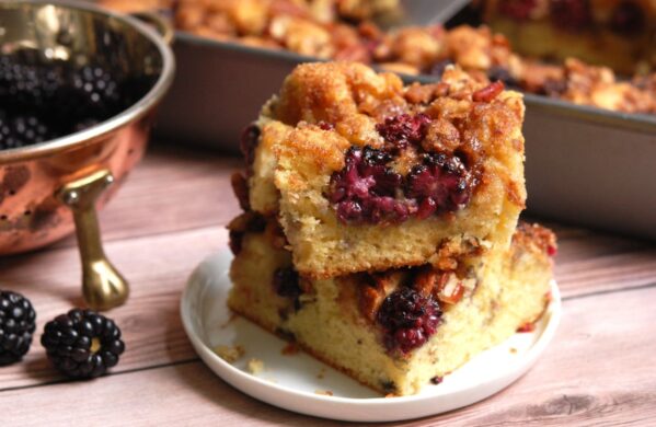 Blackberry coffee cake with sour cream and streusel topping, cut into squares