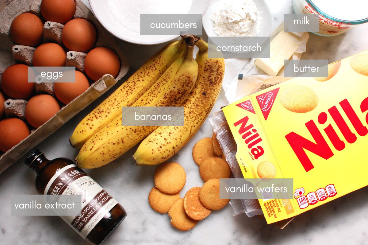Ingredients for homemade Southern banana pudding recipe from scratch, including bananas, eggs, milk, sugar, and vanilla wafers.